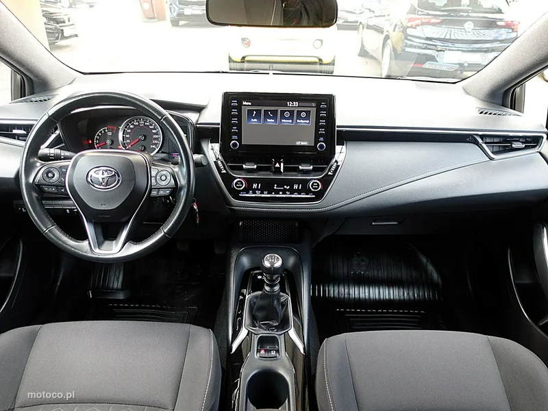 Toyota Corolla E210 13
