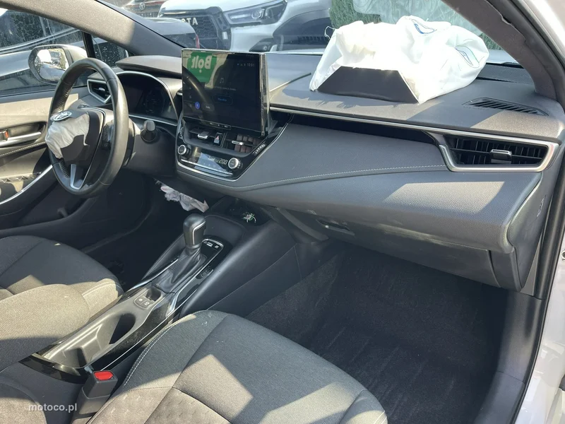 Toyota Corolla E210 10