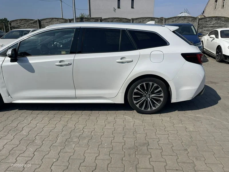 Toyota Corolla E210 6