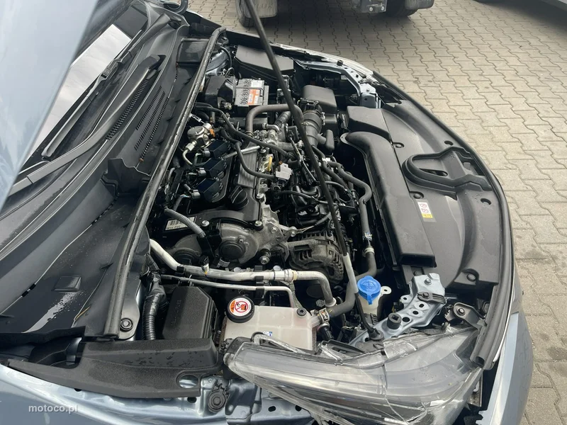 Toyota Corolla E210 13