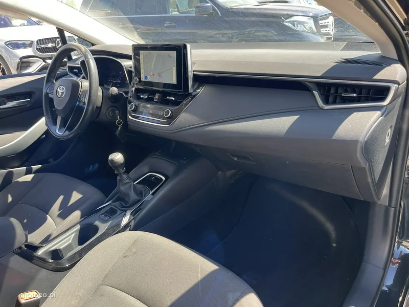 Toyota Corolla E210 13