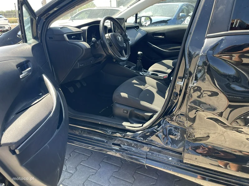 Toyota Corolla E210 6