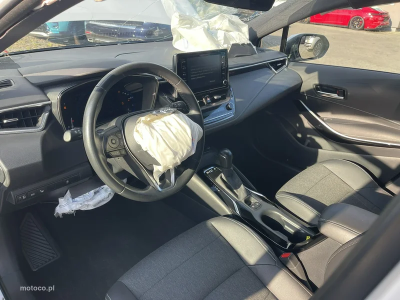 Toyota Corolla E210 6