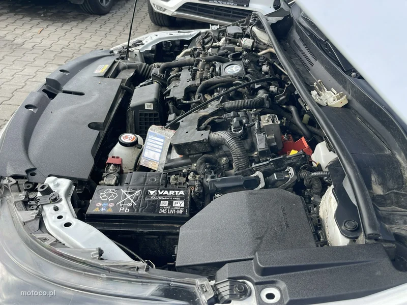 Toyota Corolla E210 10
