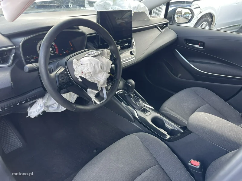 Toyota Corolla E210 6