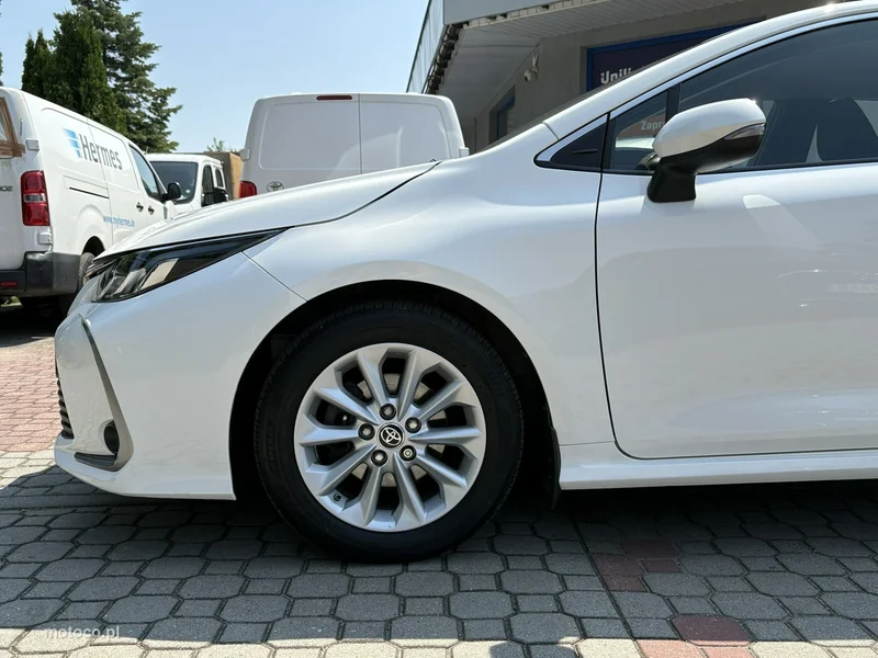 Toyota Corolla E210 10