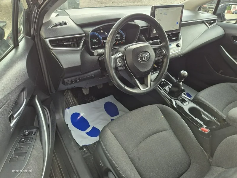 Toyota Corolla E210 13