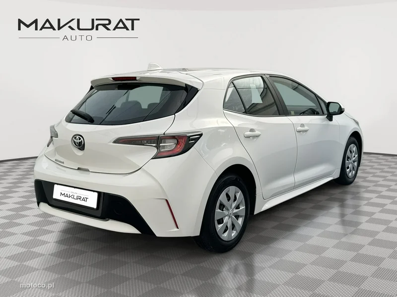 Toyota Corolla E210 3