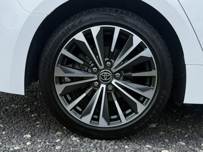 Toyota Corolla E210 12