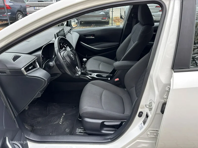 Toyota Corolla E210 10