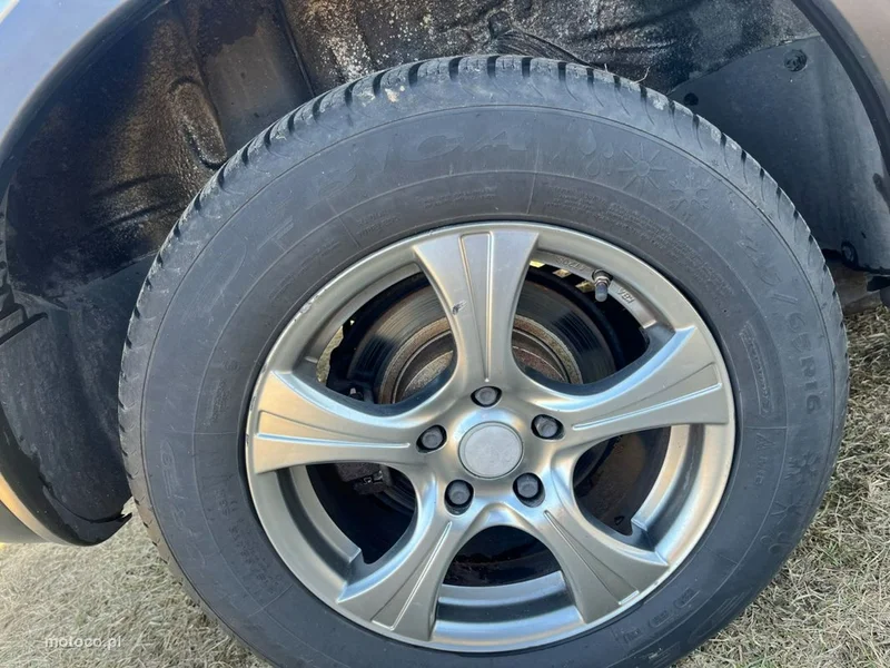 Nissan Qashqai+2 12