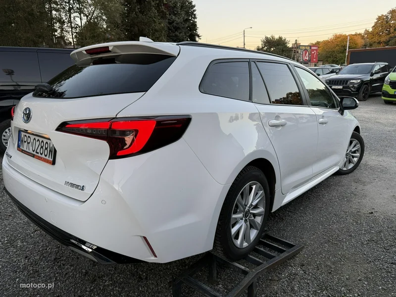 Toyota Corolla E210 7